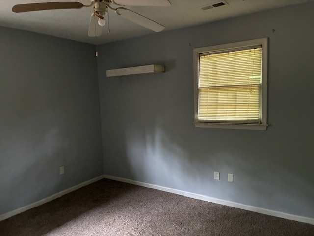 Bedroom with gray walls